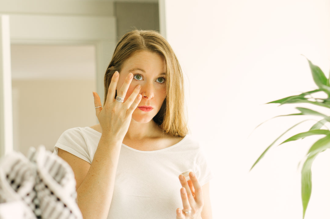 women applying makeup