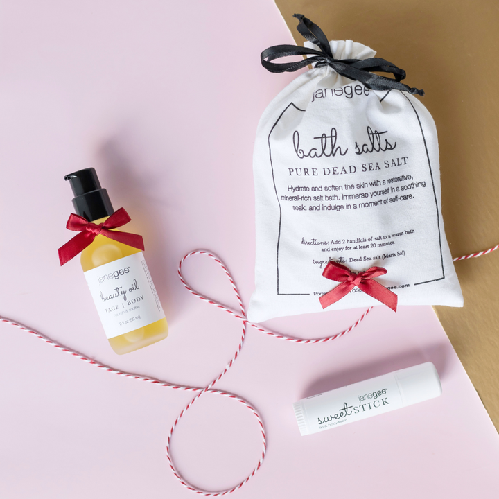 janegee kit products on a pink and gold background