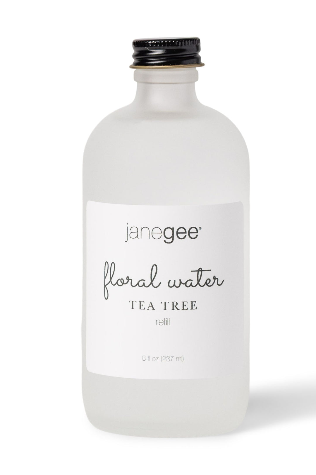 janegee floral water Tea Tree refill, 8 oz, in frosted glass bottle with black cap on a white background