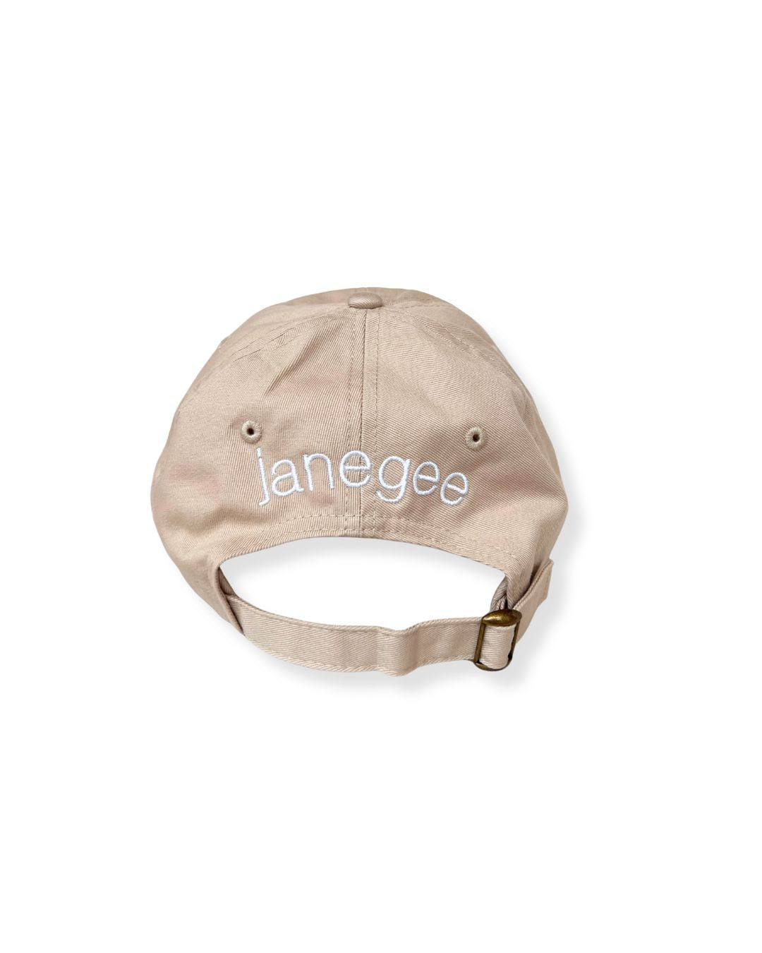 Back view of the beige janegee Everyday Botanical Cap with white embroidered janegee logo and adjustable brass buckle strap on a white background